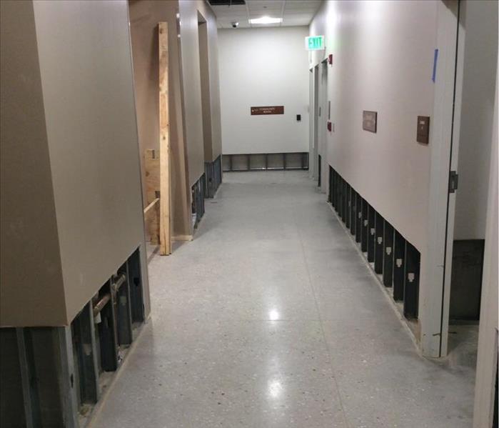 Commercial hallway with flood cuts and dry flooring.
