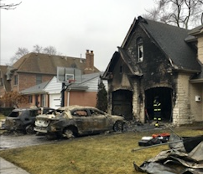 Exterior of home with fire damage.
